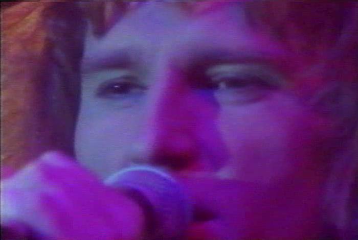 Screenshot from the music video for 'Heaven Is A 4-Letter Word'