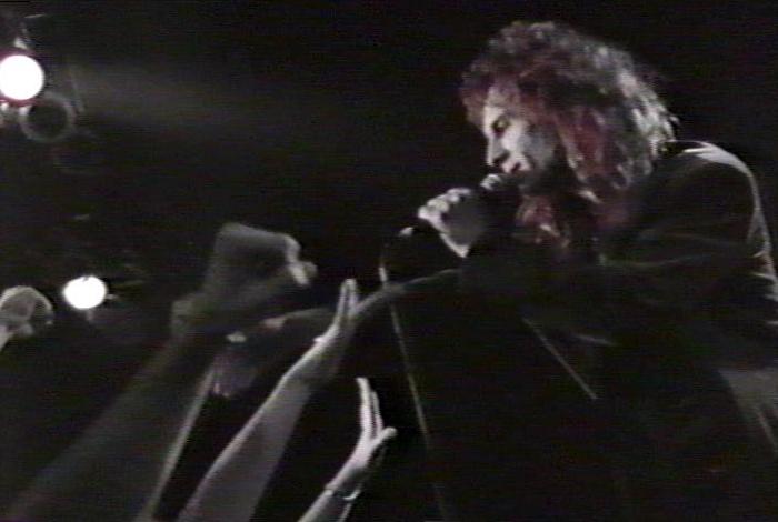 Screenshot from the music video for 'Heaven Is A 4-Letter Word'