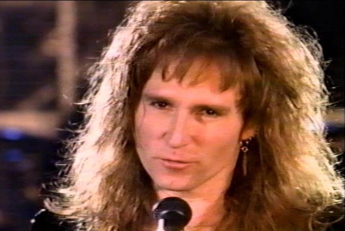 Screenshot from the music video for 'When I See You Smile'