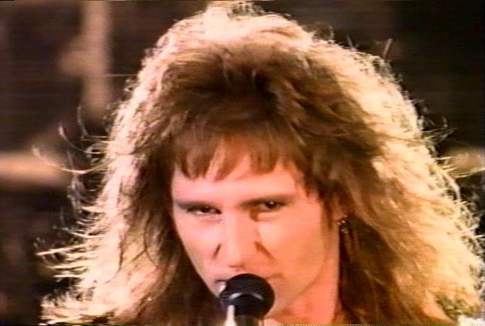 Screenshot from the music video for 'When I See You Smile'