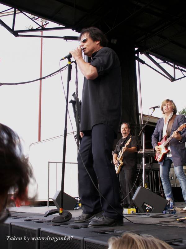 Jimi Jamison, Larry Hoppen, and Jerry Riggs live in Cheyenne, Wyoming, 24 June, 2006. Photo copyright waterdragon687; not to be reproduced without permission.